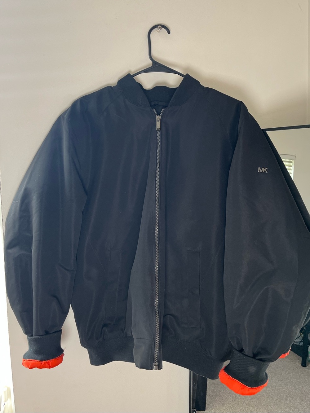 Michael Kors Black Bomber Jacket with Bright Orange Cuff Accent
